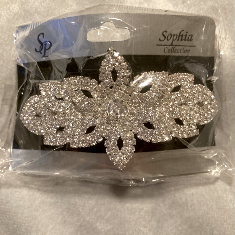 Rhinestone hair barrette.